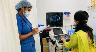 Doctor Examining Ultrasound - NU Fertility